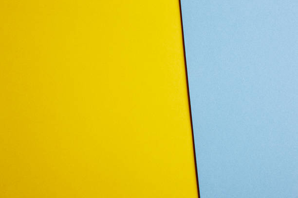 istock Colored carboards background in yellow and blue tone. Copy space 513946958