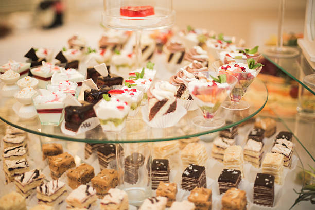 istock Different delicious desserts and cakes on the buffet table 513950672