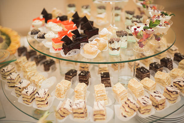 istock Different delicious desserts and cakes on the buffet table 513951334
