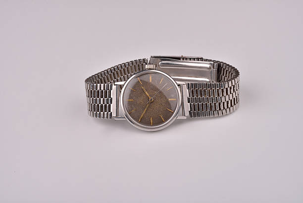 istock Old classic wrist watch for man with metal strap 513953452