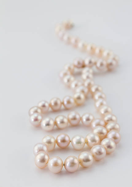 istock Pearl necklace on white background 513953966