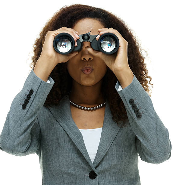 istock Businesswoman searching with binoculars 513954483