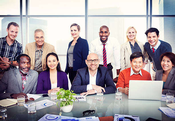 istock Group of Diverse Business People in a Board Room 513955189