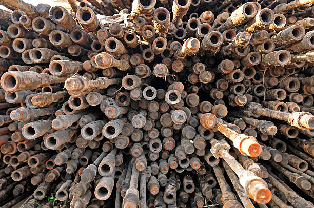 istock Stainless steel pipe pile up together 513956687