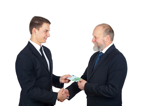 Portrait of two confident businessman makeing a deal