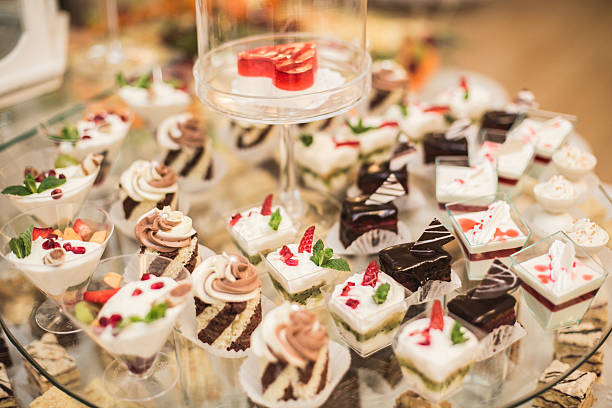 istock Different delicious desserts and cakes on the buffet table 513982434