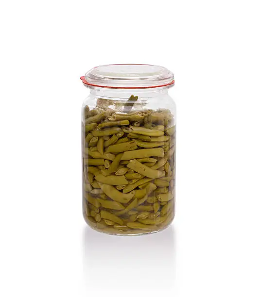 Very old pot of green string-beans, preserved, isolated on white