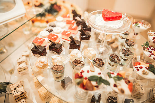 istock Different delicious desserts and cakes on the buffet table 513985536