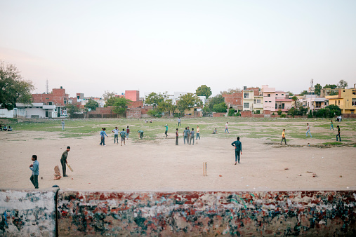 Rajasthan, India - March 17, 2014: Local people play cricket, Rajasthan, India
