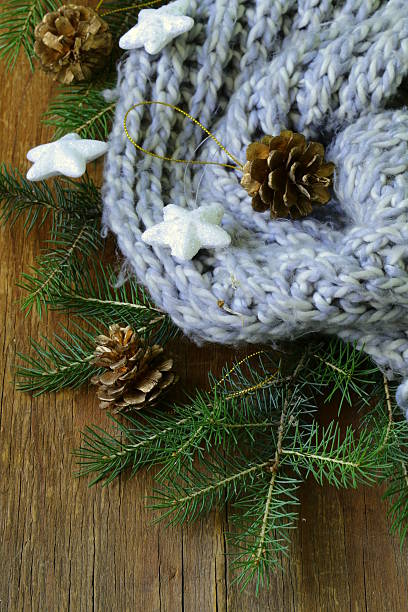 istock Christmas composition with a knitted scarf and decorations 513985623