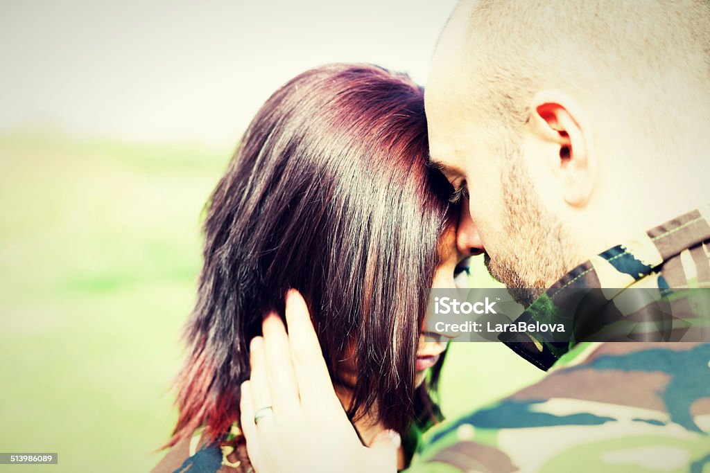 Soldiers in love Portrait of soldiers in love, outdoors. Adult Stock Photo