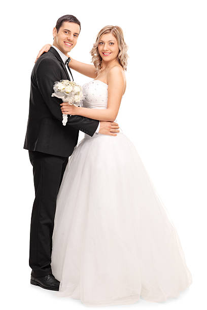 istock Newlywed couple dancing together 513986370