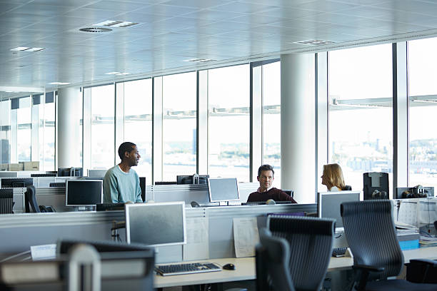 istock Hashing out some ideas in the office 513986402