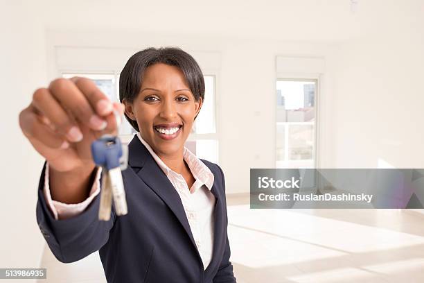 Real Estate Concept Stock Photo - Download Image Now - African Ethnicity, House Key, Human Hand