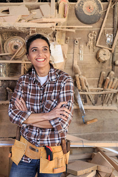 istock Cheerful businesswoman in carpenter workshop 513986992