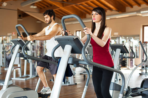 istock Group of people running on treadmills 513988434