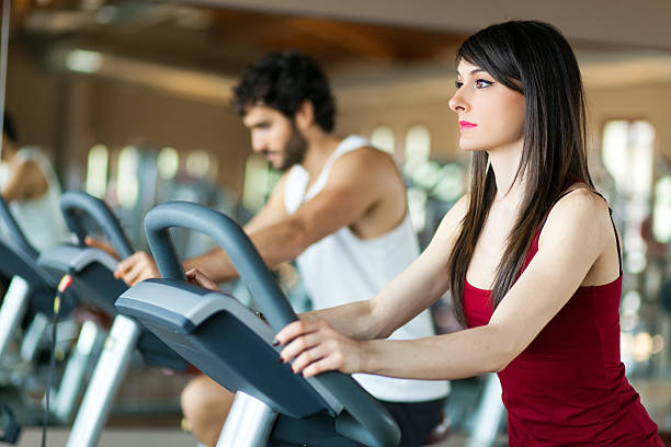 istock Group of people running on treadmills 513988530