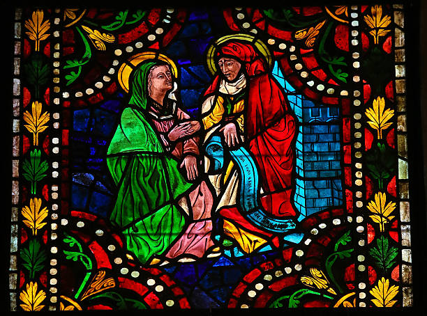 Mother Mary and Elizabeth Stained glass window depicting the Visitation, the visit of Mother Mary with Elizabeth in the cathedral of Leon, Castille and Leon, Spain. This window is more than 400 years old, no property release is required. elizabeth i of england photos stock pictures, royalty-free photos & images