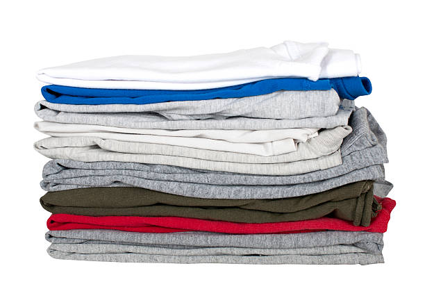 istock children's T-shirts stacked in a pile 513988729