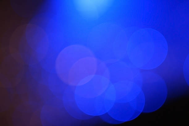 istock Dark colorful bokeh with blue light for nightlife concept 513990518