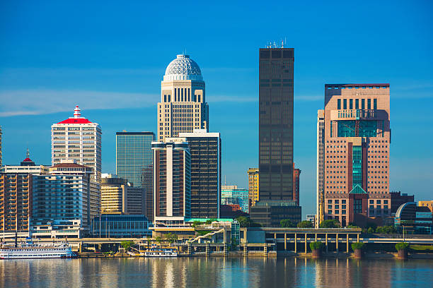 Louisville downtown skyline closeup view Louisville downtown skyline closeup view with the Ohio River. louisville kentucky stock pictures, royalty-free photos & images
