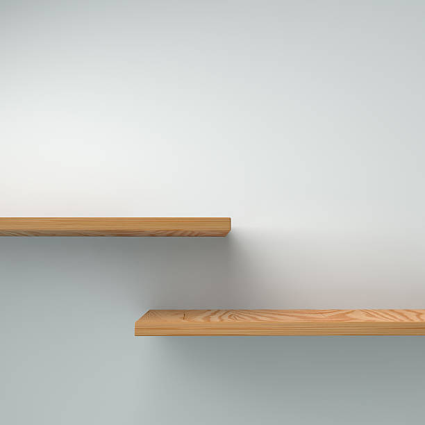 istock Blank shelf on a plain wall ready for your product 513991358