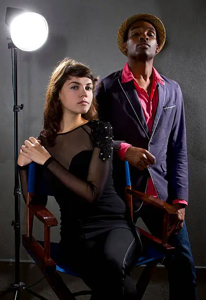 Photo of Male And Female Hollywood Actors In a Studio Set