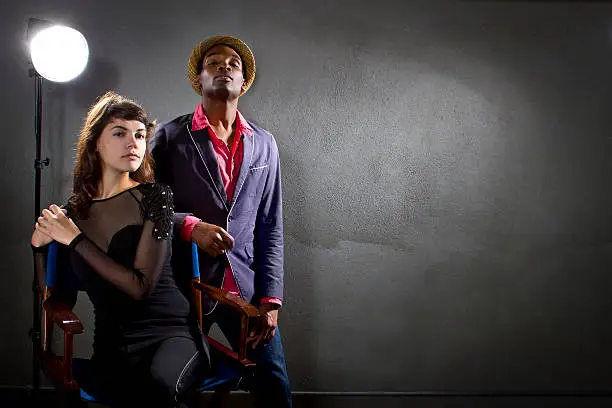 Photo of Male And Female Hollywood Actors In a Studio Set