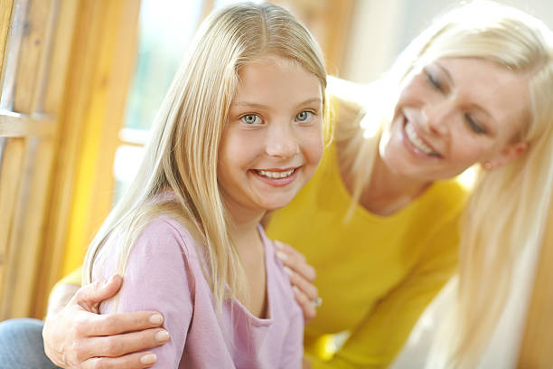 istock She's her Mom's little angel 513991581