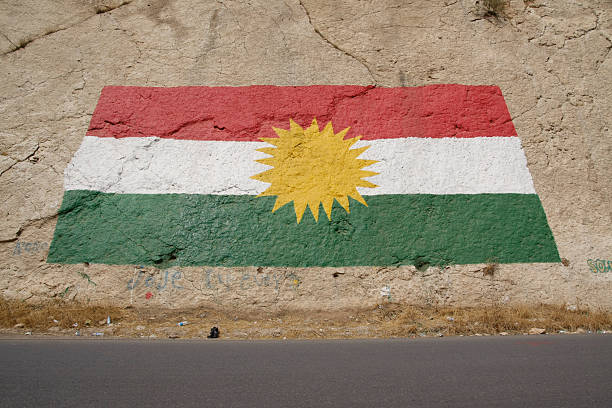 Flag of Kurdistan, North Iraq Kurdish national flag by the local road in North Iraq kurdistan stock pictures, royalty-free photos & images