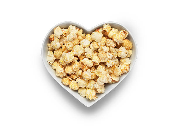 istock cinema popcorn heart on white - Stock Image 513993332