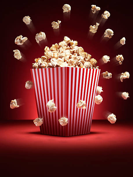 istock cinema popcorn scatter - Stock Image 513993410