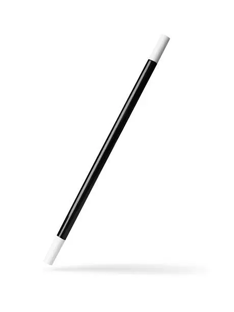 shot of a magic wand suspended in thin air with a drop shadow and clipping path isolated on a white background.