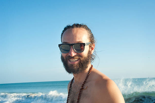 istock Handsome and Smiling Young Man with Sunglasses 513997094