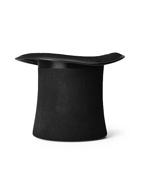 Top Hat on white background Shot of a magicians style top hat isolated on a pure white background with clipping path. black hat upside down stock pictures, royalty-free photos & images