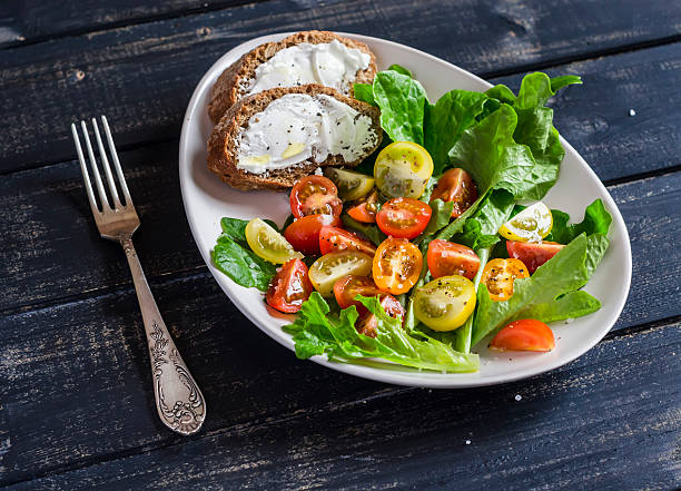 istock Fresh tomatoes and garden herbs salad and cheese sandwich 514002440