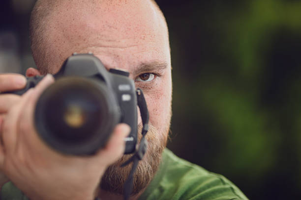 istock male photographer 514003948