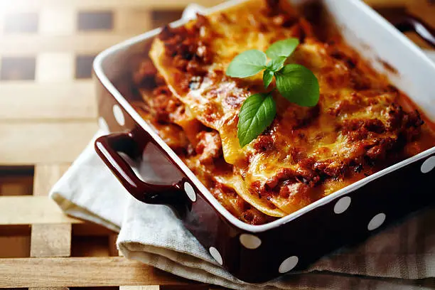 Photo of Italian Food Style. Lasagna plate.