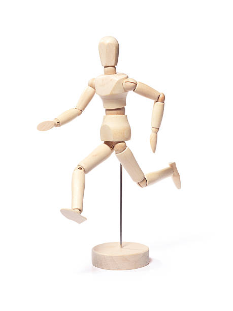 istock Running wooden model man - Stock Image 514004960