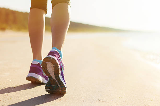 istock Running on the beach in early morning 514029577