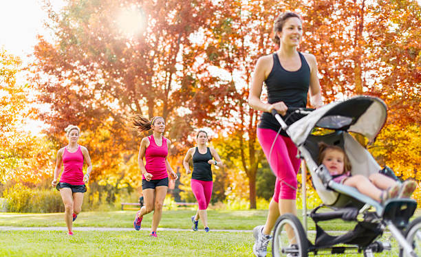 istock Mother and friends jogging 514030995