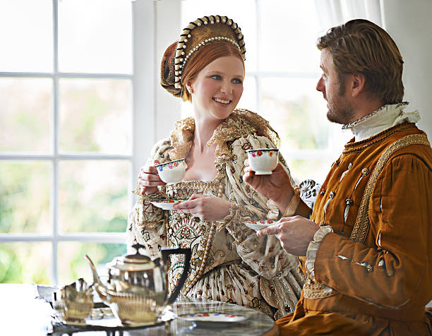 Ah tea...the mark of the civilized! A king and queen taking tea together at home civilized stock pictures, royalty-free photos & images