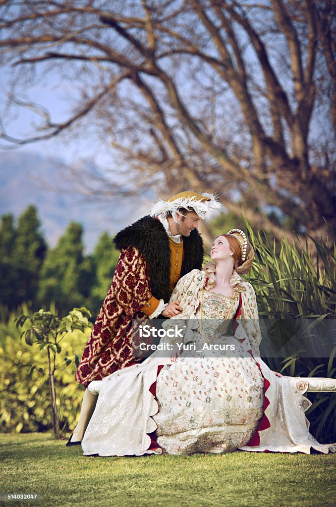 He treats her like the queen she is Shot of a royal couple spending time together at the gardens Men Stock Photo