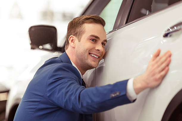 istock Young businessman in motor show 514050774