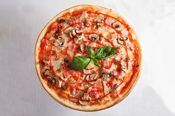 istock pizza bacon, mushrooms, ham, pork, meat and basil top 514050998