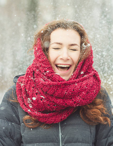 istock Woman laughing with snow 514051930