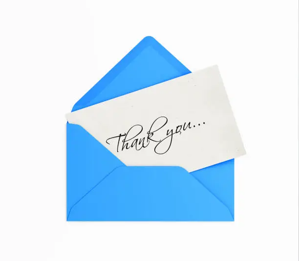 Blue envelope and thank you note. Isolated on white background. Clipping path is included.