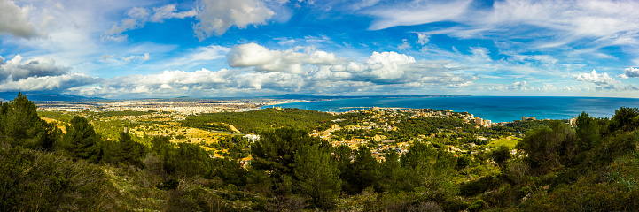 Amazing panoramic view from NA Burguesa on  breathless forest hills and bay with port Palma de Mallorca, Spain