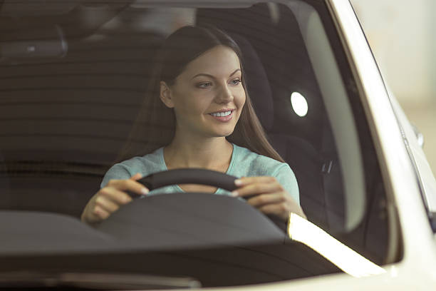 istock Woman in motor show 514057294