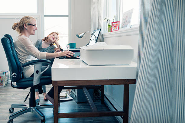 istock Home office, single mother conciliating work and family. 514059728